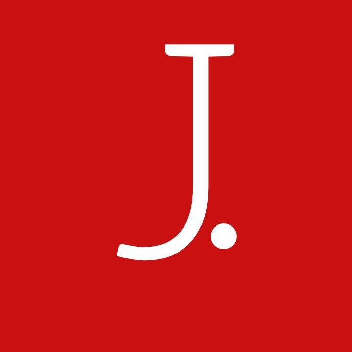 J.
